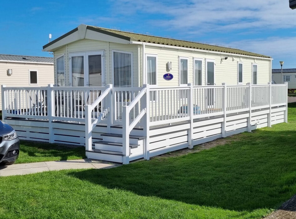 Outside View of Comber's Rest with Veranda - Outside view of Comber's Rest with verand and patio with seating area and parking space
