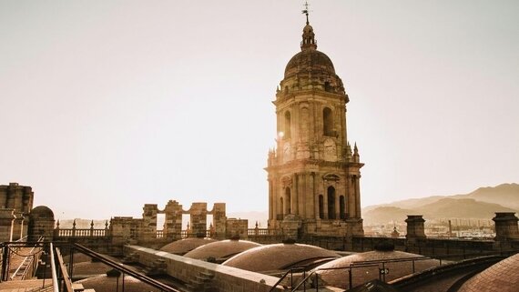 Image of Malaga Cathedral - Day trips on the Costa del Sol - Malaga cathedral roof and tower in the sunlight (© Canva)