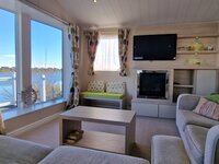 Lounge with TV and Fireplace