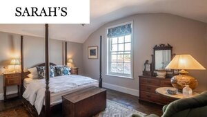 Case Study of Sarah's short let apartment - Double bedroom with a 4 poster bed and wooden furniture. Case Study of Sarah's short let apartment - Double bedroom with a 4 poster bed and wooden furniture.