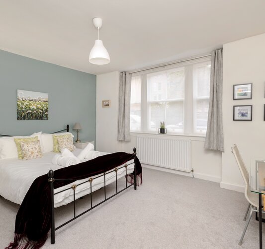 Masterbed pic 1  - Beautiful master bedroom with king size bed and dressing table and chair.