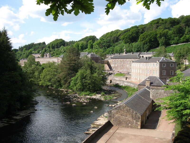 New Lanark from the River Clyde Walkway - View over buildings in New Lanark with the river below. (© Graeme Yuill, CC BY-SA 2.0) New Lanark from the River Clyde Walkway - View over buildings in New Lanark with the river below. (© Graeme Yuill, CC BY-SA 2.0)