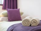 Twin Bedroom - Close up on soft furnishings in the twin bedroom of Edinburgh holiday apartment.
