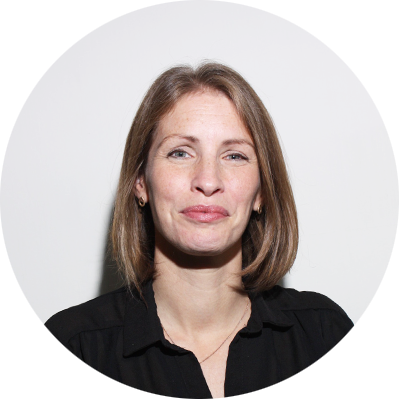 Kelly Odor - Kelly Odor is a female, seen smiling in this photo with bobbed hair and a black shirt in a professional staff photo for Bookster Marketing Software.
