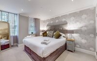 28-web-or-mls-242 West George Street Clyde_31 - Stylish bedroom offering a peaceful retreat