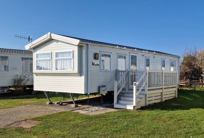Outside view of Brookside - Outside view of Brookside with stairs and decking on the side