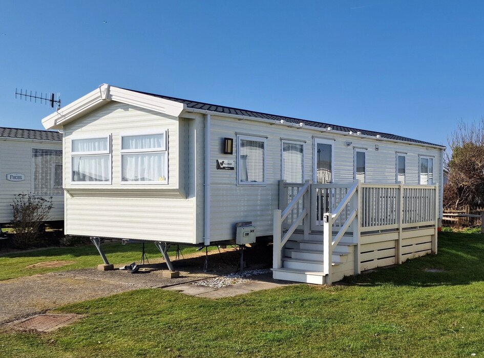 Outside view of Brookside - Outside view of Brookside with stairs and decking on the side