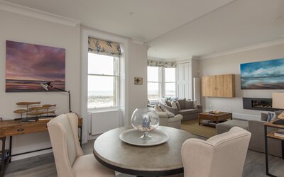 Sitting/dining area, The Beach House, North Berwick - Looking from the dining area through the sitting room to the sea beyond, North Berwick holiday apartment