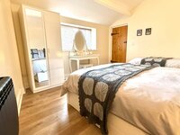 Bedroom with double and single bed