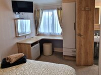 Master Bedroom with TV and Ensuite