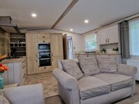 Through View of Lounge, Kitchen and Dining Areas