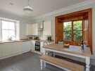 Kitchen at SeaPink Cottage - Large kitchen, and solid wood dining table and chairs in holiday home North Berwick,