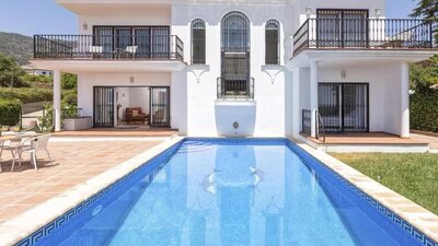 Swimming pool - A south-facing swimming pool with panoramic views, basking in all-day sunshine, offering a tranquil setting—seamlessly connected to the villa’s stylish interior for effortless indoor-outdoor living and total relaxation.