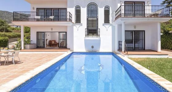 Swimming pool - A south-facing swimming pool with panoramic views, basking in all-day sunshine, offering a tranquil setting—seamlessly connected to the villa’s stylish interior for effortless indoor-outdoor living and total relaxation.