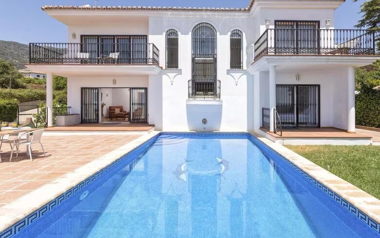Swimming pool - A south-facing swimming pool with panoramic views, basking in all-day sunshine, offering a tranquil setting—seamlessly connected to the villa’s stylish interior for effortless indoor-outdoor living and total relaxation.