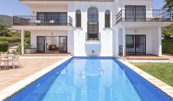 Swimming pool - A south-facing swimming pool with panoramic views, basking in all-day sunshine, offering a tranquil setting—seamlessly connected to the villa’s stylish interior for effortless indoor-outdoor living and total relaxation.