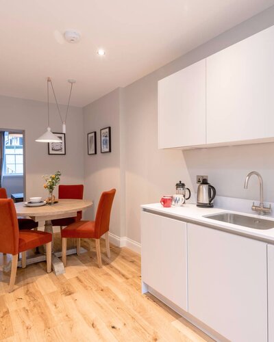 Stafford Street Apartment Kitchen Diner - Bright kitchen diner with table and four chairs