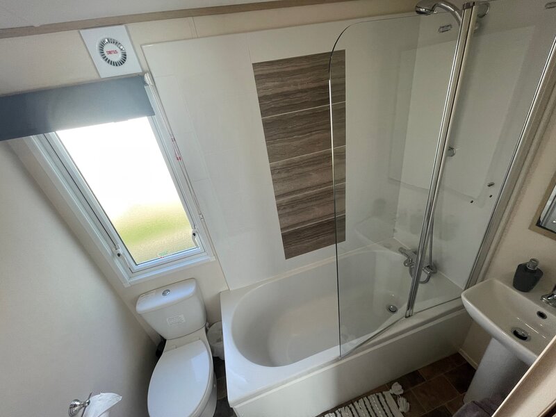 En suite with bath and shower