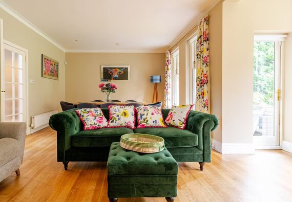 Inviting Living & Dining Rooms in Cramond - Stylish and welcoming, the living area blends comfort with vibrant touches for a homely feel