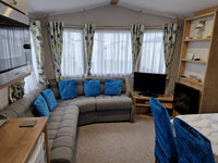 Lounge Area with TV and Fireplace