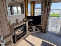 Lounge with TV and Fireplace