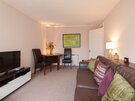 Living Room - Living room, with flat screen TV and dining table in self catering accommodation, Edinburgh.