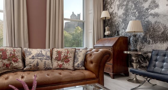 Contemporary Living Space with Scottish Character - Elegant yet cosy, this living room pairs sleek contemporary décor with subtle Scottish touches - Scottish accents, local artwork, and plush seating for ultimate comfort.