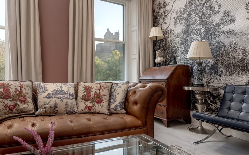 Contemporary Living Space with Scottish Character - Elegant yet cosy, this living room pairs sleek contemporary décor with subtle Scottish touches - Scottish accents, local artwork, and plush seating for ultimate comfort.