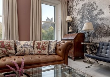 Contemporary Living Space with Scottish Character - Elegant yet cosy, this living room pairs sleek contemporary décor with subtle Scottish touches - Scottish accents, local artwork, and plush seating for ultimate comfort.
