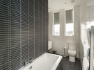 Brunswick Street 5 - Modern family bathroom with bath and overhead shower in Edinburgh holiday let