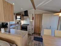 Loungr, dining area and kitchen