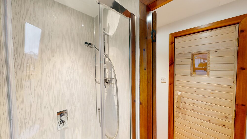 Upstairs shower and sauna