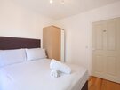 Bedroom - Bedroom with double bed, mirrored wardrobe and featuring polished floorboards in Edinburgh holiday home.