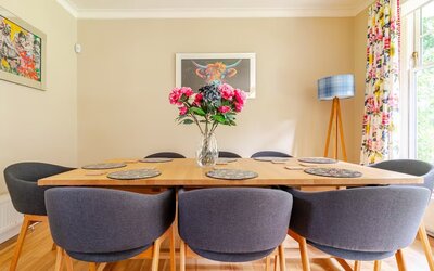 Bright Dining Area in a Self-catered Let - Gather around this bright and stylish dining table, perfect for sharing meals and good conversation