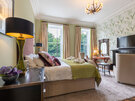 Luxurious Master Bedroom for a Business Trip - Spacious and elegantly designed bedroom featuring a modern décor and fantastic views of the Castle