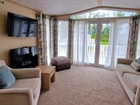 Lounge with TV and Fireplace