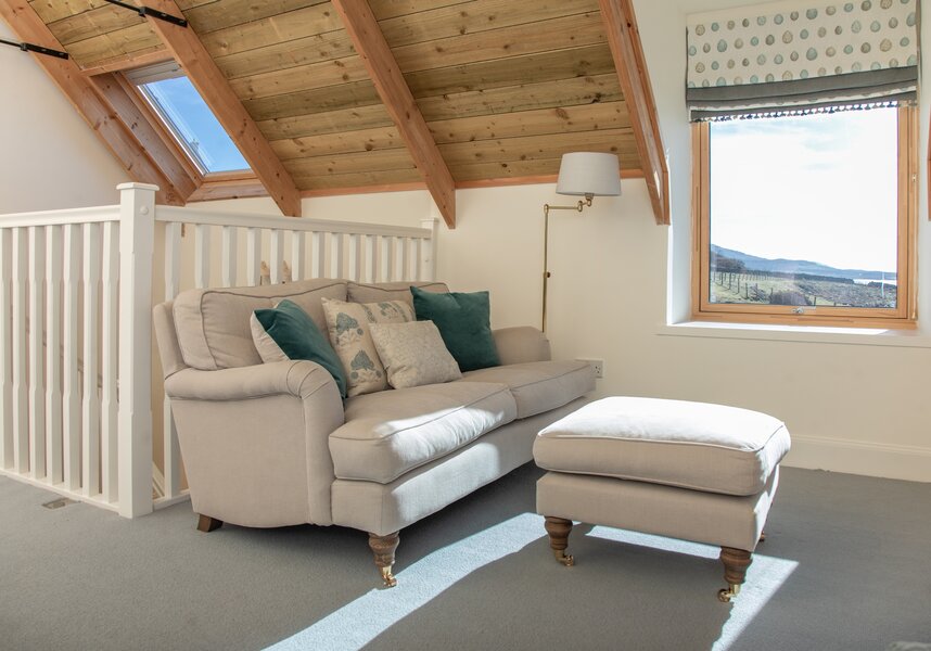 Sun-Drenched Mezzanine Lounge in a Highland Getaway