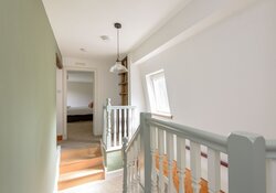 Hallway with double staircase
