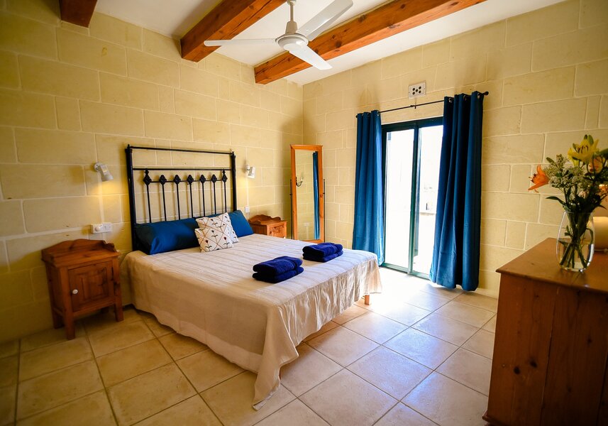 14. Main bedroom with ensuite and terrace overlooking pool area