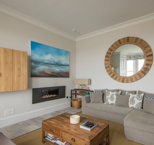 Sitting room, The Beach House - Grey plush furnishing and a feature flame effect gas fire in North Berwick holiday home.