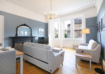 The Newington Residence - living room - Spacious and elegant living room, showcasing original architectural features in Edinburgh holiday home.