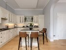 Open-plan, Family-friendly Kitchen Area - A straight-on view of the stylish gourmet kitchen, emphasising its spacious layout and premium finishes